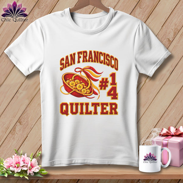A white t-shirt features red and yellow text that reads San Francisco #14 Quilter.