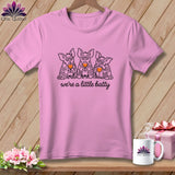 Pink t-shirt with three bats wearing blankets and holding wine glasses, text reads 