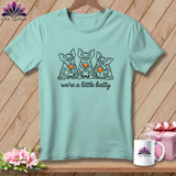 Mint t-shirt with three cartoon bats holding wine glasses, text 