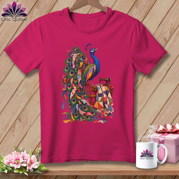Fuchsia t-shirt with a colorful peacock and quilting motif.