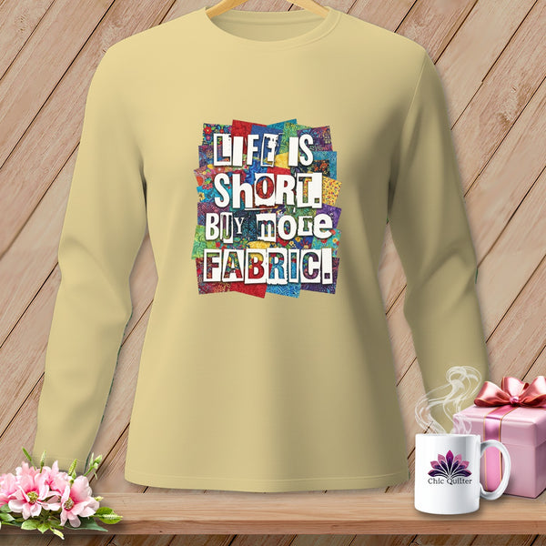 Light yellow long sleeve shirt with "LIFE IS SHORT. BUY MORE FABRIC!" text graphic.