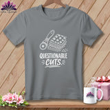 Gray t-shirt with white graphic of rotary cutter, fabric stack, and text 