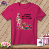 Pink t-shirt with a llama tangled in yarn and text 