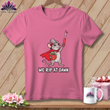A pink t-shirt displays a graphic of a mouse holding a seam ripper with the text WE RIP AT DAWN.