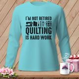 Light blue long-sleeve shirt with text 