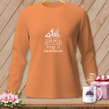 Orange long-sleeve shirt with white house graphic and text 