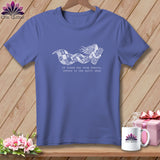 Periwinkle t-shirt with white graphic of a woman flying with a quilt and text.