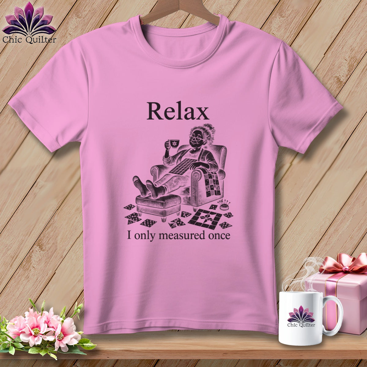Pink t-shirt with "Relax, I only measured once" graphic featuring a quilter.
