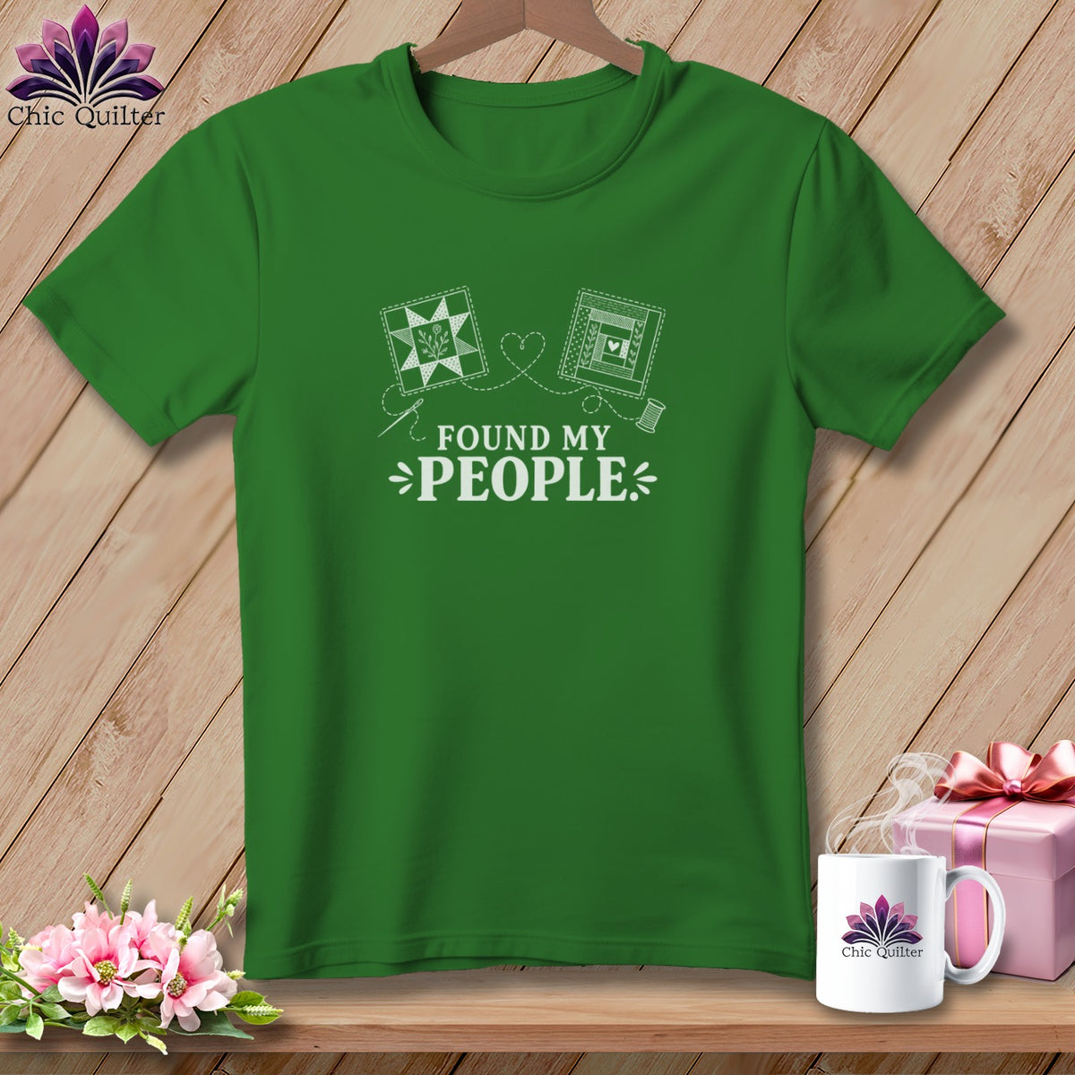Green t-shirt with "Found My People" text and quilting designs.