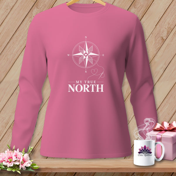 Pink long-sleeve shirt with compass graphic and "My True North" text.