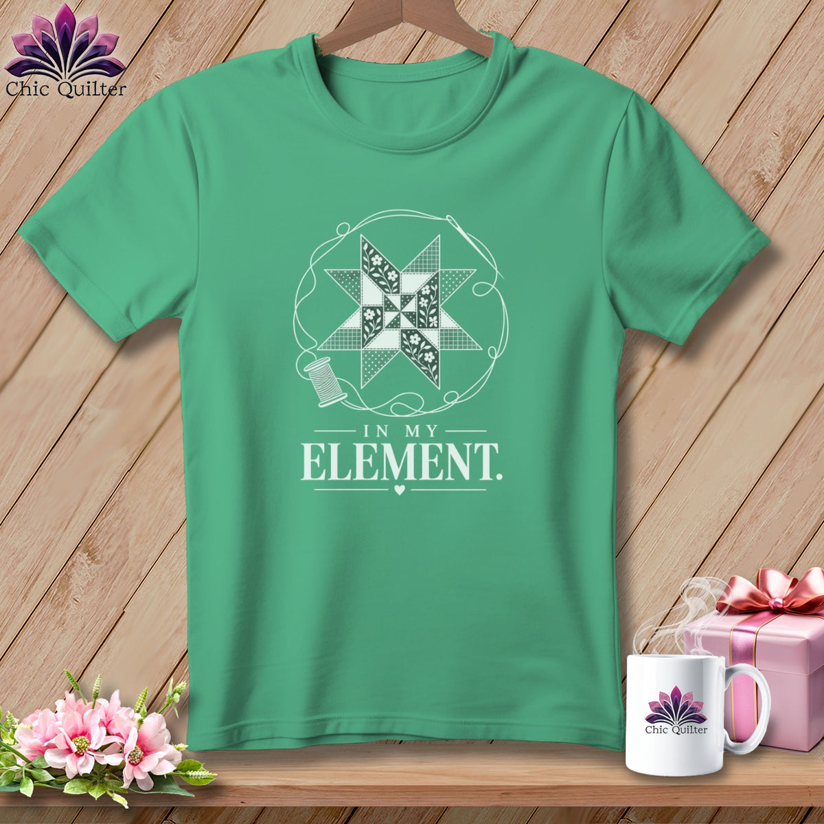 Teal t-shirt with quilting design and "In My Element" text.