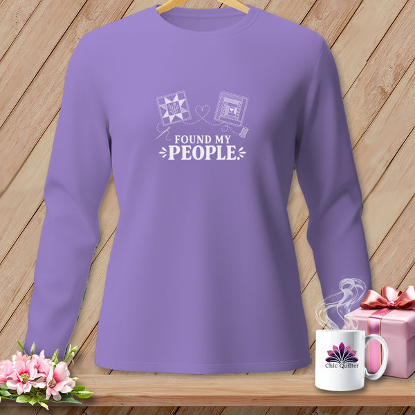 Purple long-sleeve shirt with "Found My People" and quilt designs.