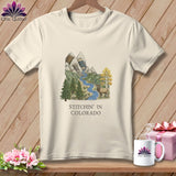 Cream t-shirt with mountain, river, elk, and text 