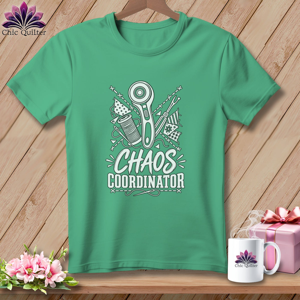 Green t-shirt with "Chaos Coordinator" text and sewing graphics.