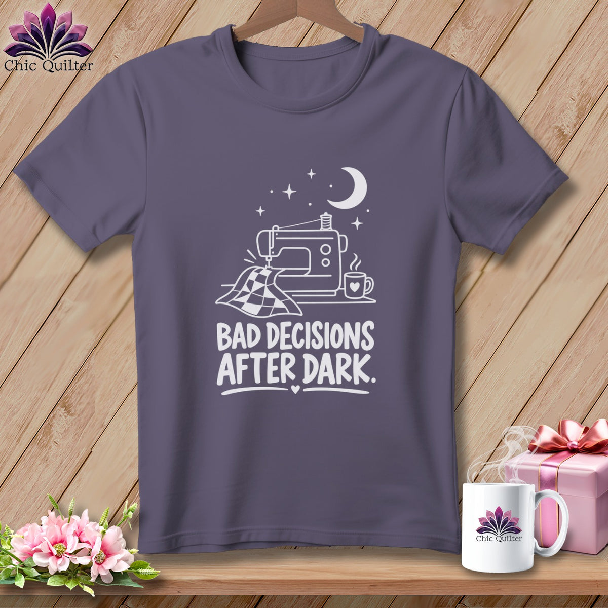 Purple t-shirt with sewing machine graphic and text "BAD DECISIONS AFTER DARK."