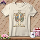 T-shirt with a skeleton rib cage filled with fabric scraps and a pumpkin.