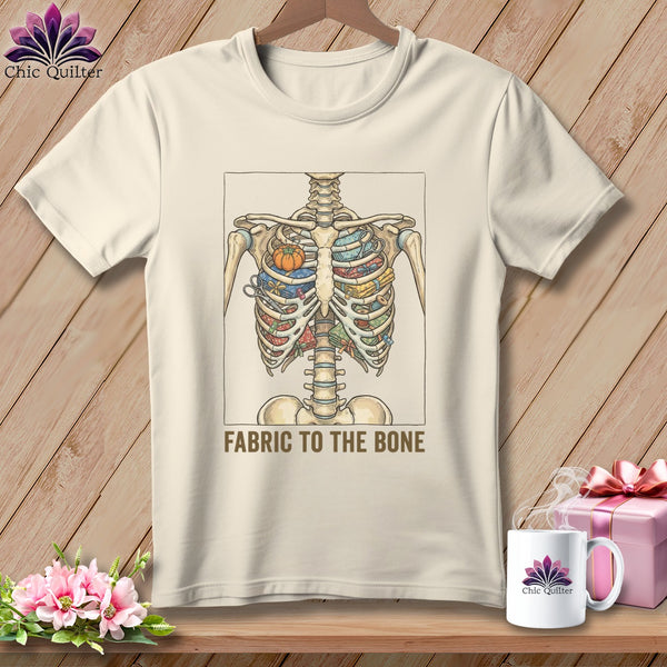 T-shirt with a skeleton rib cage filled with fabric scraps and a pumpkin.