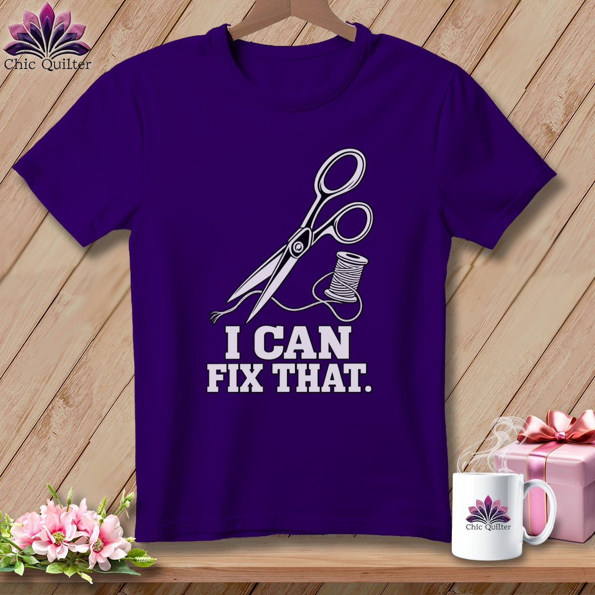 Purple t-shirt with scissors, thread, and "I CAN FIX THAT" text.