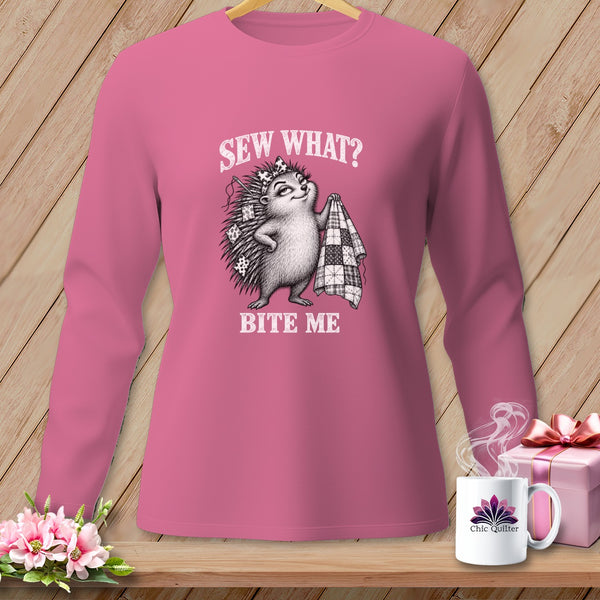 A pink long-sleeved shirt features a graphic of a hedgehog holding a quilt with the text SEW WHAT? BITE ME.