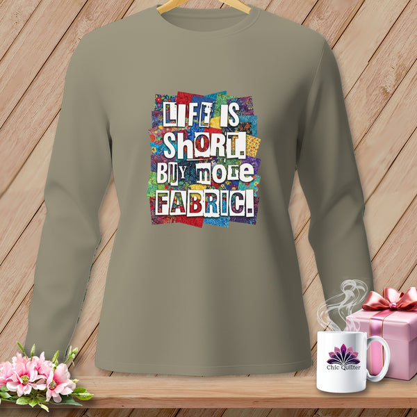 Long-sleeved shirt with "Life is Short, Buy More Fabric!" text on colorful fabric squares.