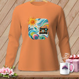 Orange long-sleeved shirt with a colorful square graphic of a sewing machine and sun.