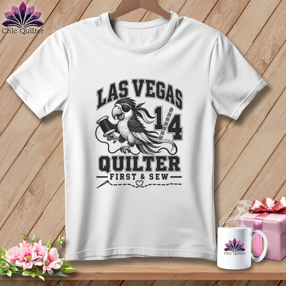 White t-shirt with a parrot quilt design featuring the text Las Vegas Quilter First and Sew.