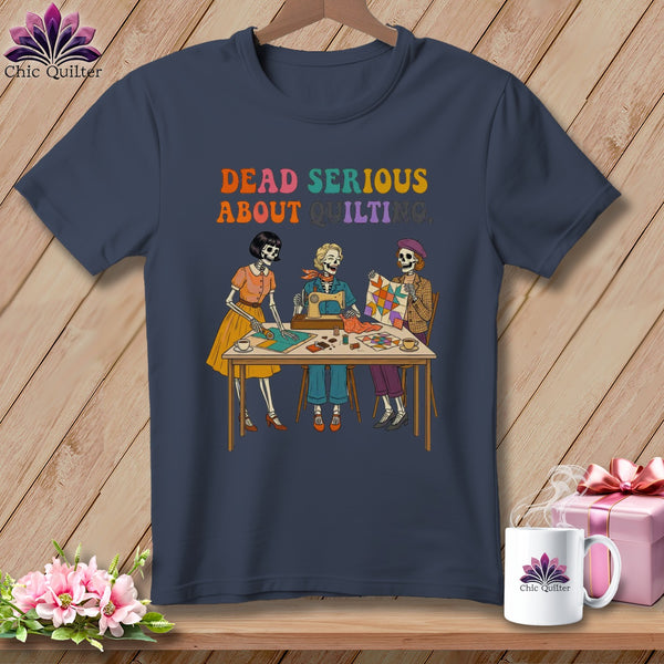 Skeleton quilters sew with sewing machine and fabric, text reads "DEAD SERIOUS ABOUT QUILTING."