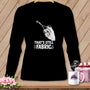Black shirt with white graphic of scissors cutting fabric and text "That's still fabric".
