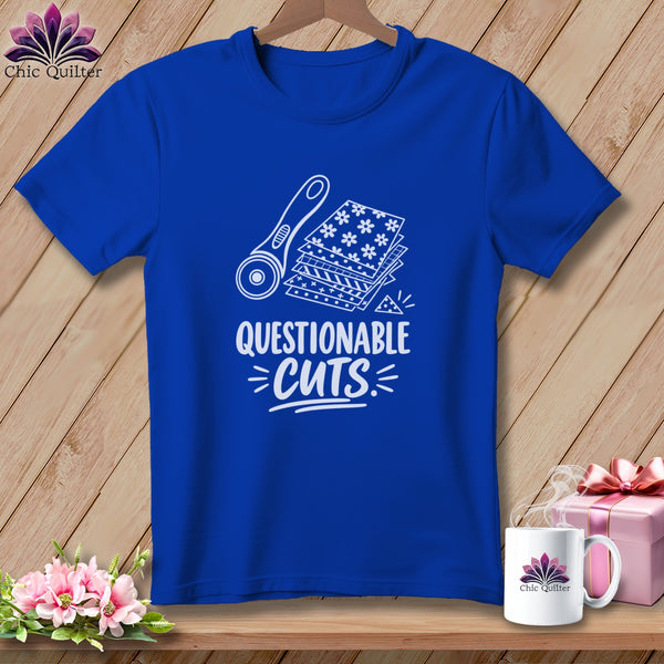 Royal blue t-shirt with "Questionable Cuts" graphic and quilting tools.