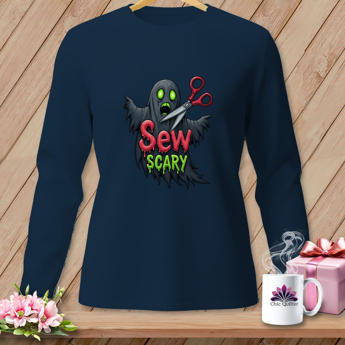 Navy long-sleeve shirt with a graphic of a ghost holding scissors and the text "Sew Scary".