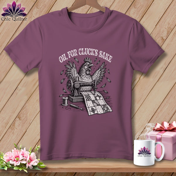 T-shirt with a chicken sewing a quilt, text reads "Oh, For Cluck's Sake".