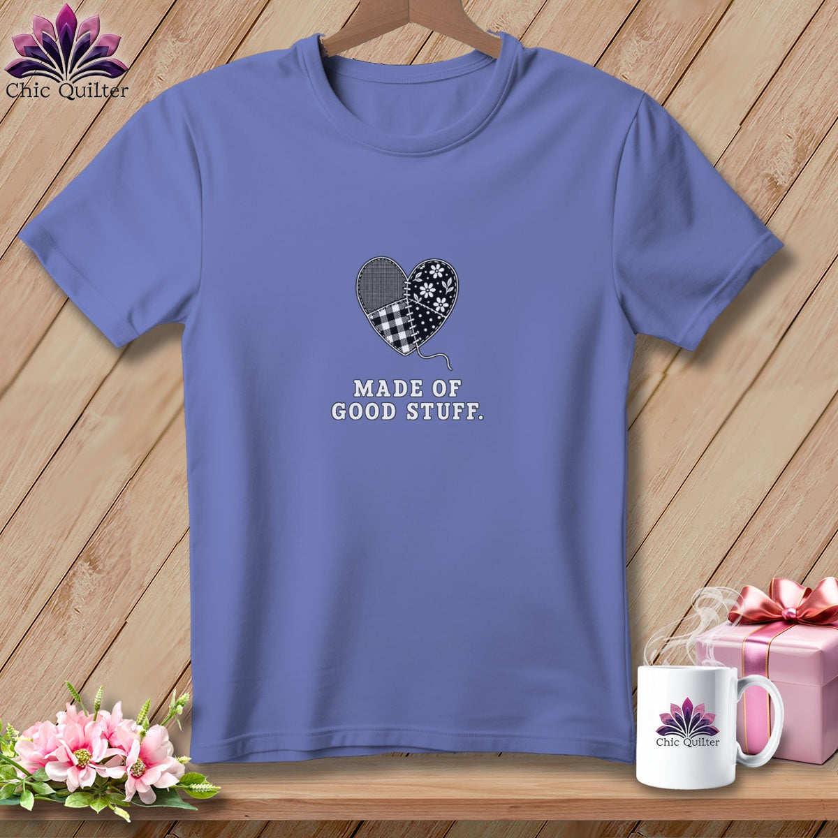 Lavender t-shirt with a patchwork heart graphic and text "Made of Good Stuff."