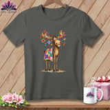A dark gray crewneck t-shirt featuring a cartoon moose wearing a colorful patchwork quilt, displayed on a wooden background.
