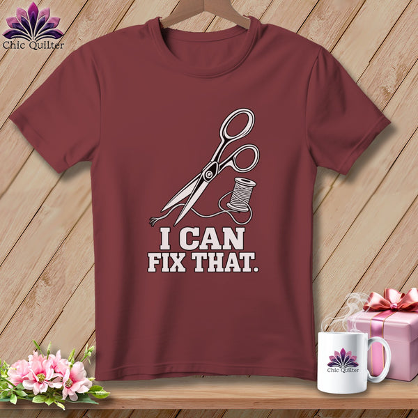 Maroon t-shirt with scissors, thread, and text "I CAN FIX THAT."