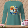 Teal long-sleeve shirt with a square graphic of a sewing machine in waves under a sun.