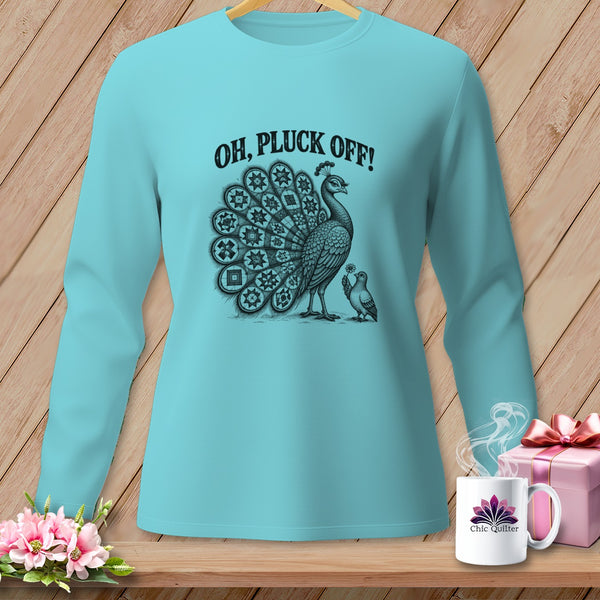 A long-sleeve light blue t-shirt with a black graphic of a peacock and the text OH, PLUCK OFF!