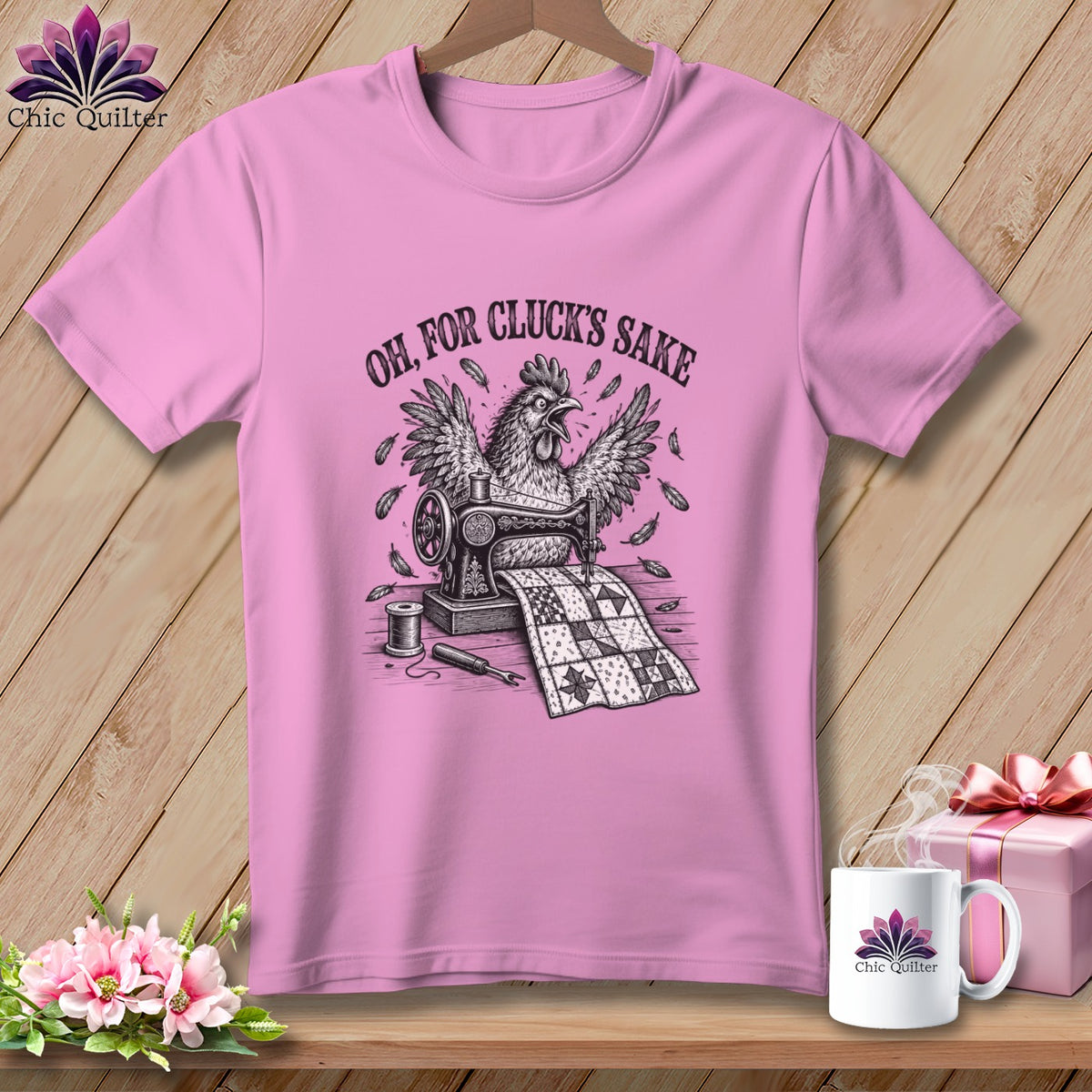 Pink t-shirt with a chicken and sewing machine graphic and "Oh, For Cluck's Sake" text.