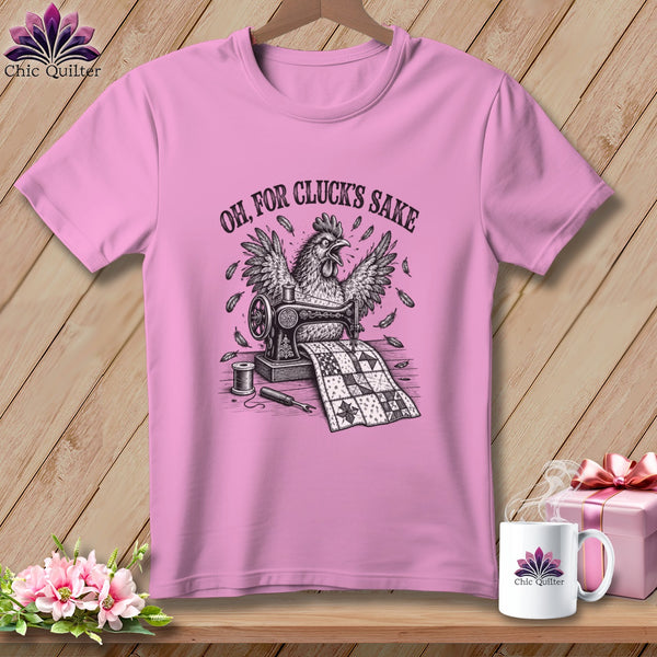 Pink t-shirt with a chicken and sewing machine graphic and "Oh, For Cluck's Sake" text.