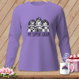 Purple long-sleeve shirt with three illustrated women peeking over a patchwork quilt and 