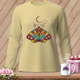 Light yellow long-sleeve shirt with a colorful patchwork moth graphic and crescent moon.