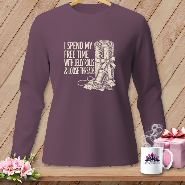 Purple long sleeve shirt with "I spend my free time with jelly rolls & loose threads" text.