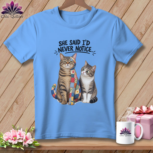 Blue t-shirt with two cats and text "SHE SAID I'D NEVER NOTICE."
