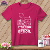 Pink t-shirt with sewing machine, fabric, clock, and 