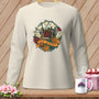 Long sleeve cream shirt with "Sew Spooky" graphic featuring sewing machine, ghosts, and flowers.