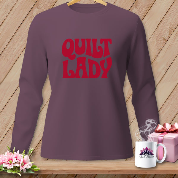 Purple long-sleeve shirt with red "Quilt Lady" text.