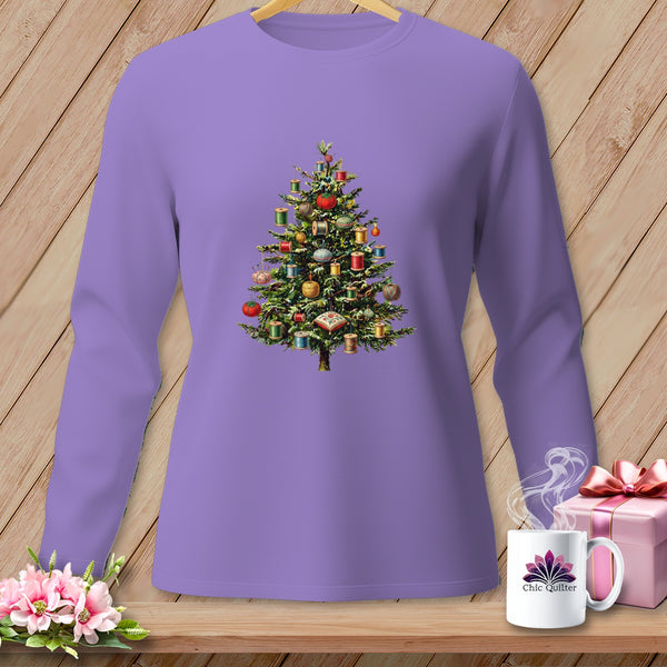 Purple long-sleeve shirt with a Christmas tree adorned with sewing spools.