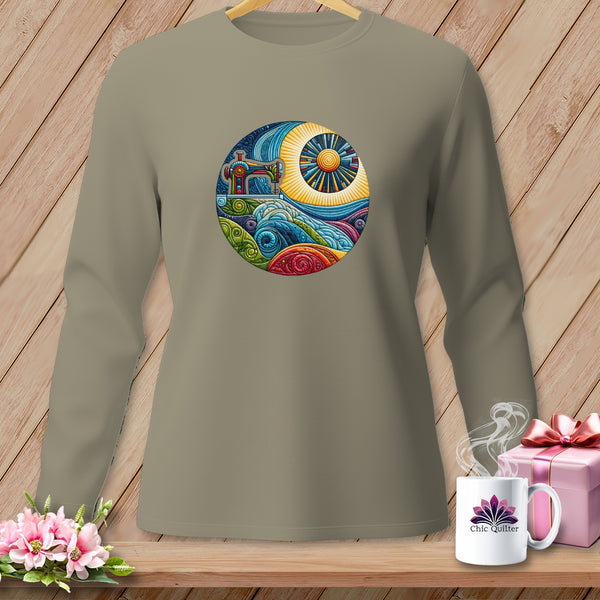 T-shirt with circular graphic of sewing machine, sun, and colorful waves.