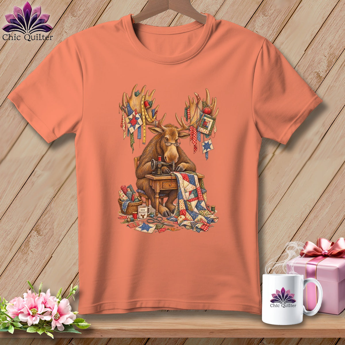Moose sewing quilt with quilting supplies, "Sew Moosey" mug, and Chic Quilter logo.