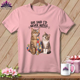 Pink t-shirt with two cats and text 