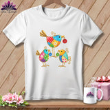 A white t-shirt featuring a colorful patchwork design of three stylized birds holding buttons.